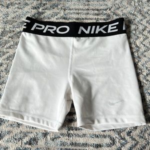 Girls Nike pros, never worn, white
